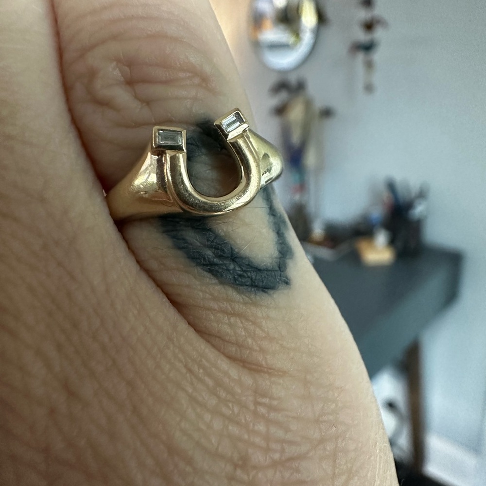 SOLD. 14k gold Baguette diamond horseshoe pinky ring